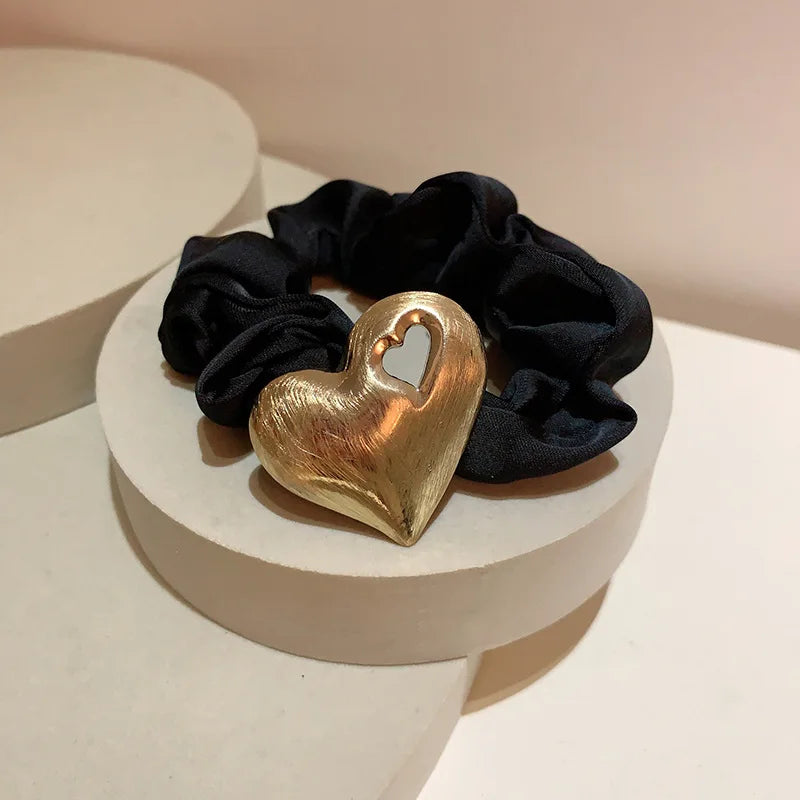 Elegant Black Silk Scrunchie with Gold Metal Accent – Geometric Hair Band