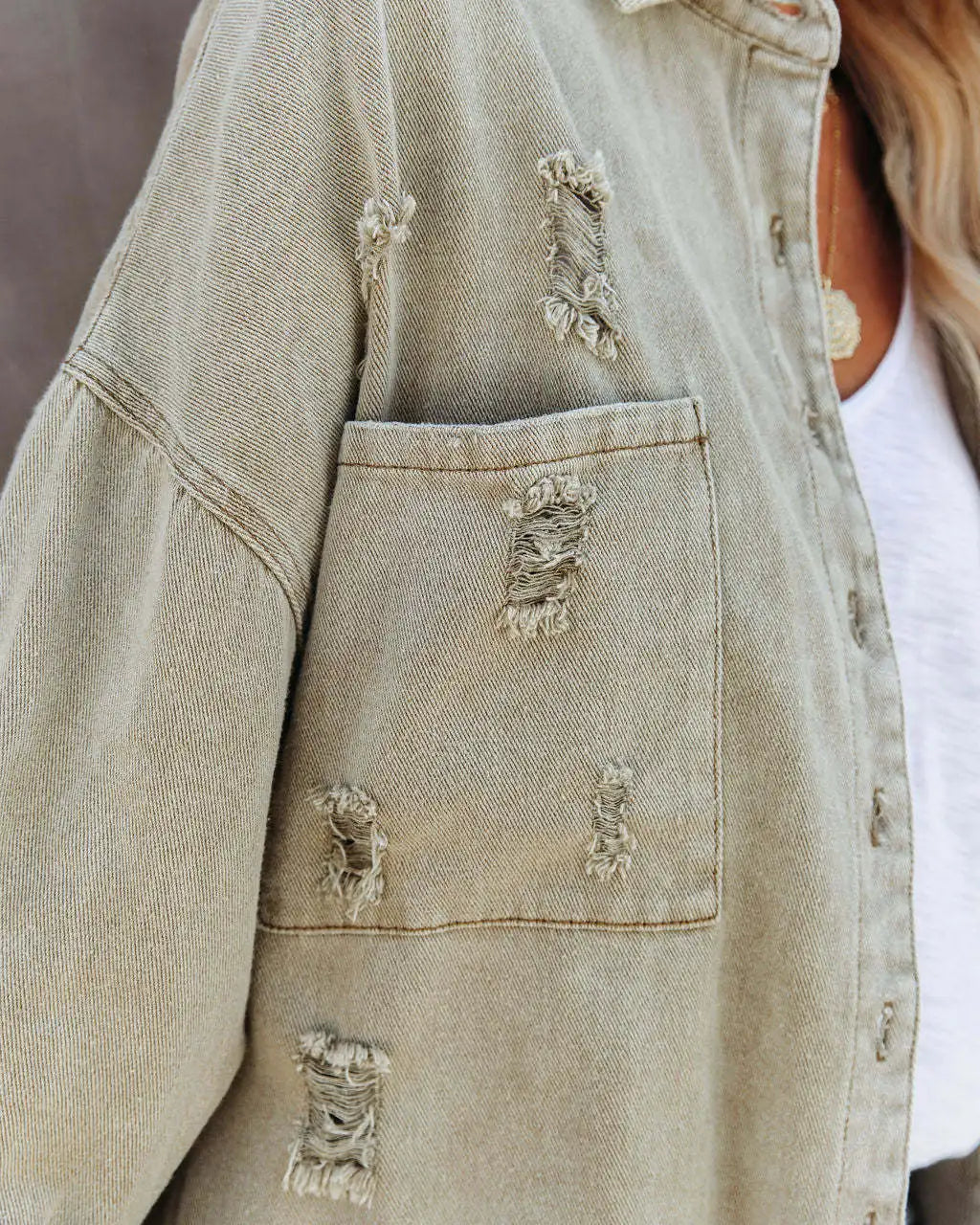 Ripped Denim Jacket with Tassels