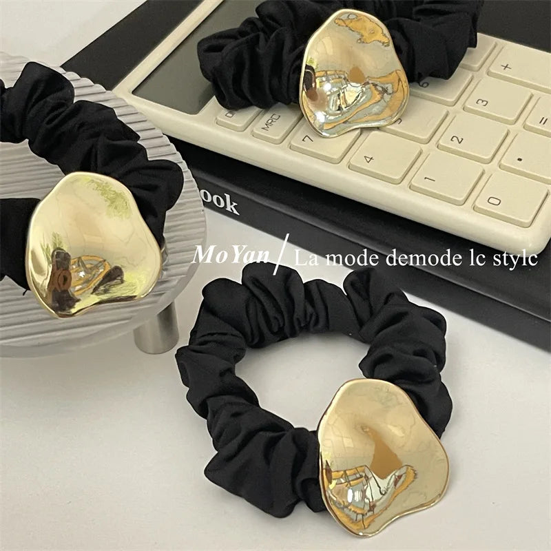 Elegant Black Silk Scrunchie with Gold Metal Accent – Geometric Hair Band