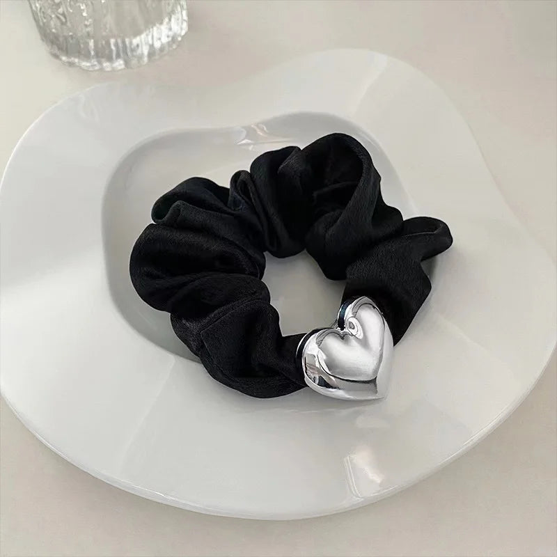 Elegant Black Silk Scrunchie with Gold Metal Accent – Geometric Hair Band