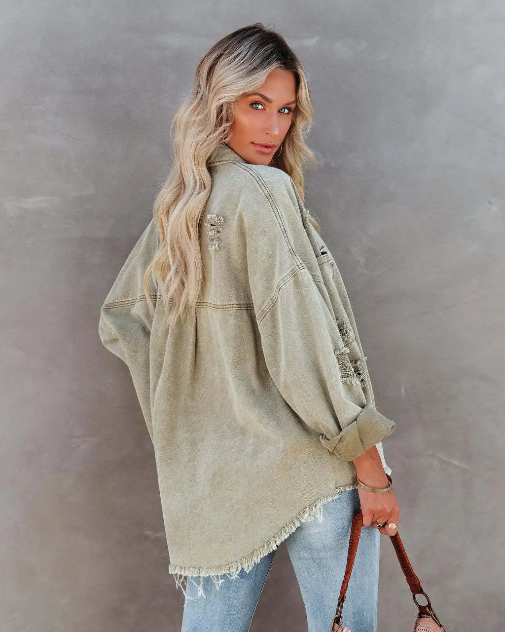 Ripped Denim Jacket with Tassels